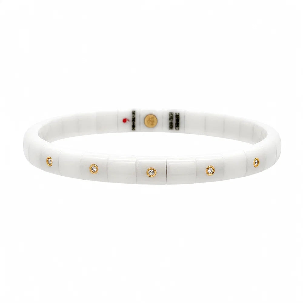 ROBERTO DEMEGLIO PURA WHITE CERAMIC BRACELET HAVING FIVE 18K YELLOW GOLD ALTERNATING DIAMOND BEZELS, 0.10TW