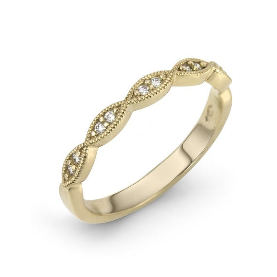 MAX STRAUSS 14K YELLOW GOLD INFINITY INSPIRED RING HAVING MILL GRAIN EDGES SET WITH SMALL ROUND DIAMONDS 0.08 TW GH/SI.
