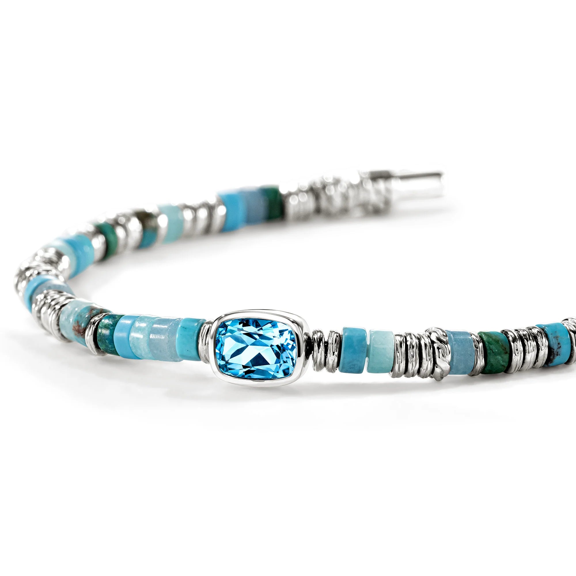 JOHN HARDY HESHI STERLING SILVER BEAD BRACELET WITH 8 X 6 TREATED SWISS BLUE TOPAZ AND 4MM TREATED TURQUOISE, BLUE QUARTZ, AMAZONITE, TREATED BLUE MAGNESITE AND TREATED GREEN CHRYSOCOLLA BEADS WITH PUSHER CLASP. SIZE MEDIUM