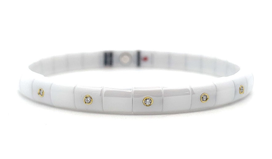 ROBERTO DEMEGLIO PURA WHITE CERAMIC BRACELET HAVING FIVE 18K YELLOW GOLD ALTERNATING DIAMOND BEZELS, 0.10TW