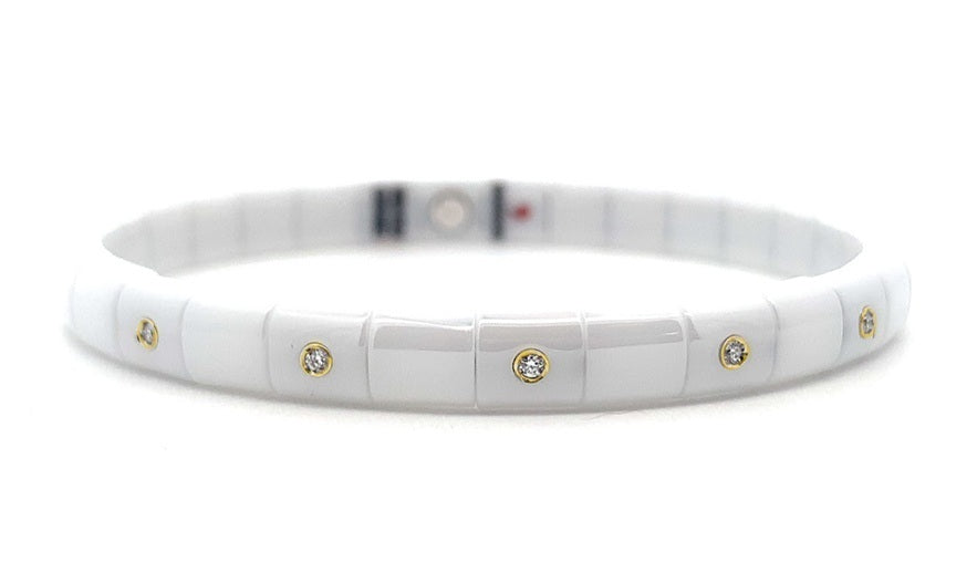ROBERTO DEMEGLIO PURA WHITE CERAMIC BRACELET HAVING FIVE 18K YELLOW GOLD ALTERNATING DIAMOND BEZELS, 0.06TW