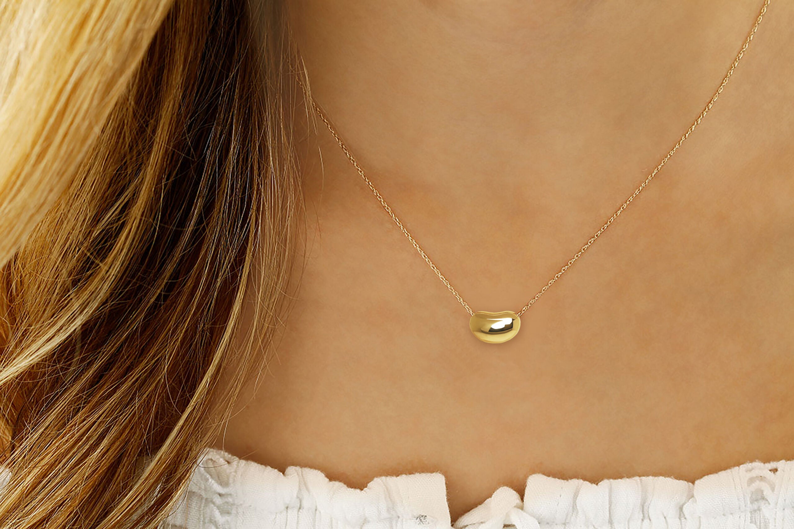 CARLA 14K YELLOW GOLD BEAN PENDANT ON AN 18 INCH ROPE CHAIN
