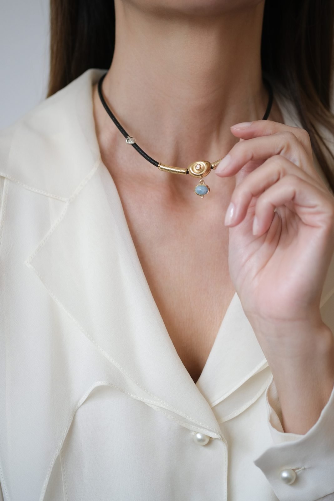 LEATHER NECKLACE WITH 18K GOLD NUGGET, DIAMOND AND MILKY CABOCHON AQUAMARINE