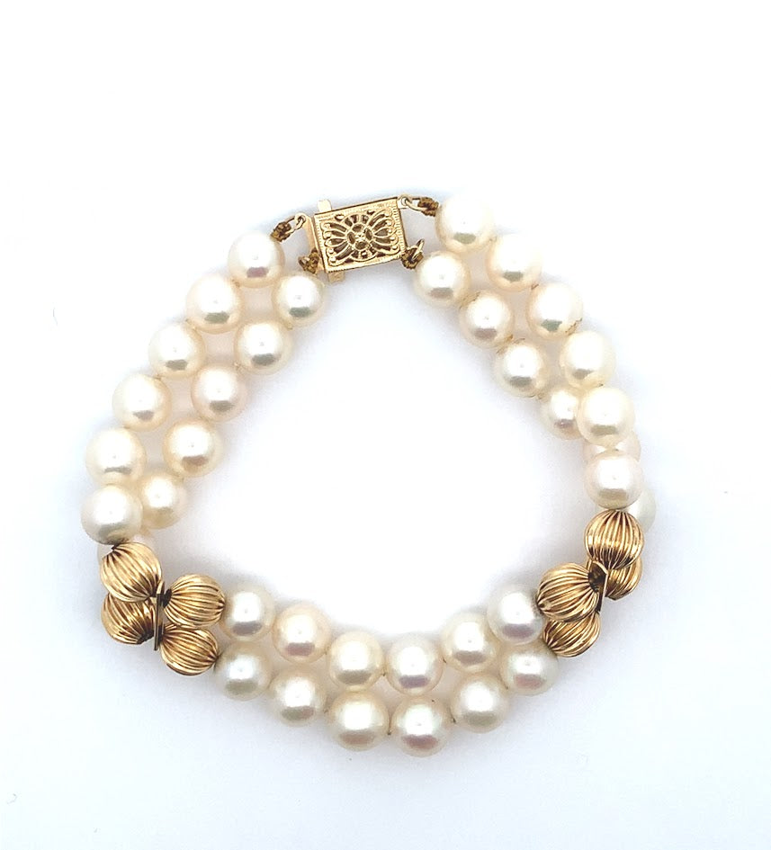 DOUBLE STRAND BRACELET WITH 7-7.5MM AKOYA PEARLS /14K YELLOW GOLD ROUND FLUTED BALL ACCENTS
