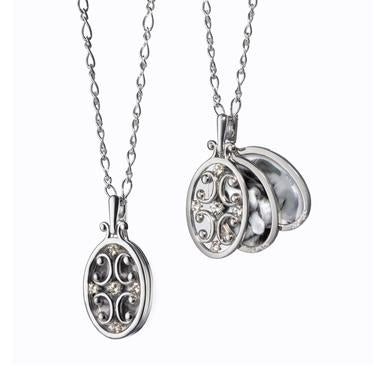 MONICA RICH KOSANN STERLING SILVER OVAL GATE FRAME NECKLACE WITH TWO IMAGE CASES AND WHITE SAPPHIRE STONES ON 30" CHAIN. HOLDS 2 PHOTOS