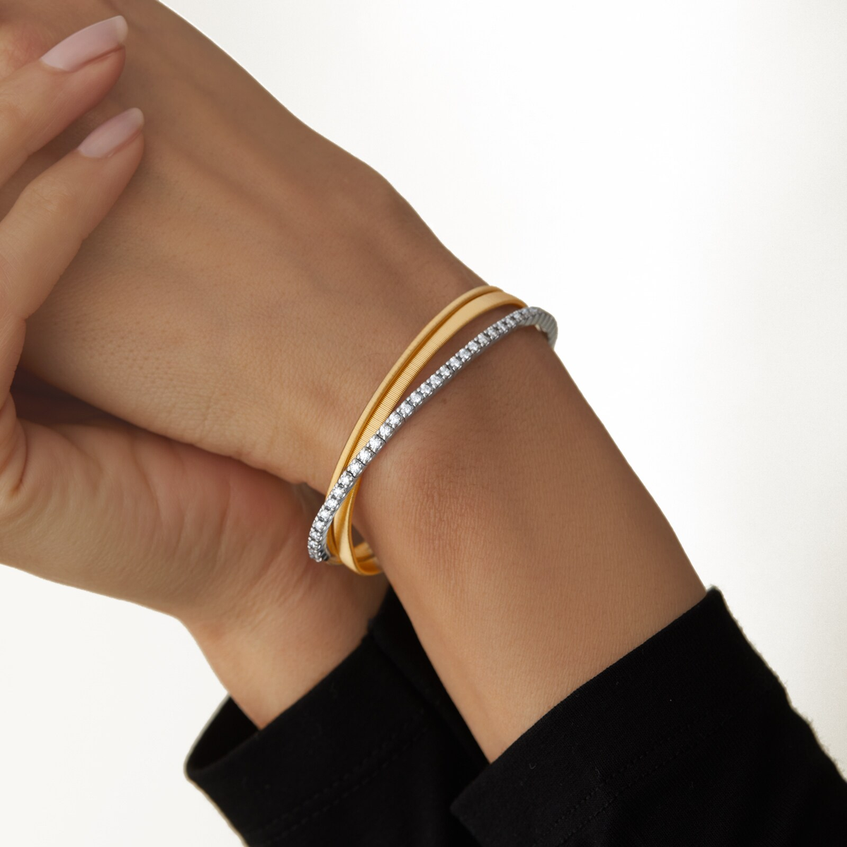 MARCO BICEGO MASAI 18K YELLOW AND WHITE GOLD THREE STRAND COIL BRACELET WITH DIAMONDS 0.95 CARATS TW